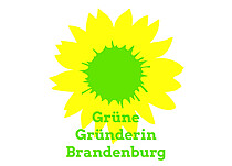 das Logo der Grünen Gründerin: auf weißem Grund eine Sonnenblume, hellgrün der Punkt und die Aufschrift: Grüne Gründerin. Diesen Aufkleber bekommen alle Grünen Gründerinnen zur Auszeichnung überreicht - neben Blumenstrauß und Urkunde.